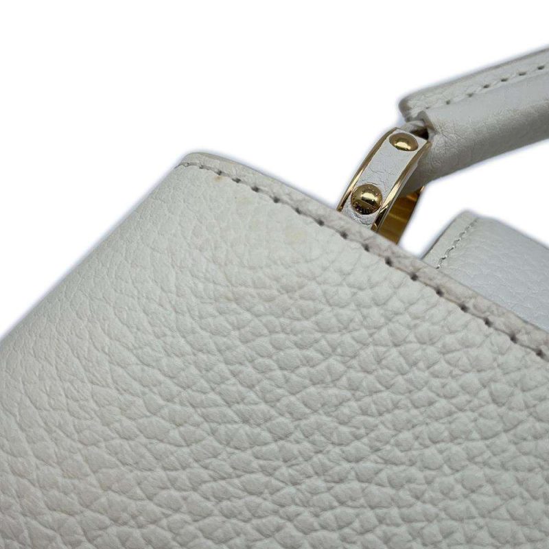 LOUIS VUITTON Capucines Wallet Black Taurillon - Image 11