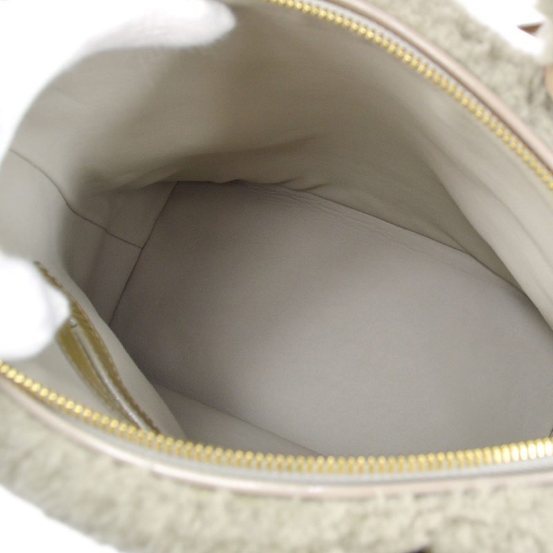 LOUIS VUITTON 2011 LOCKIT M93850 - Image 7
