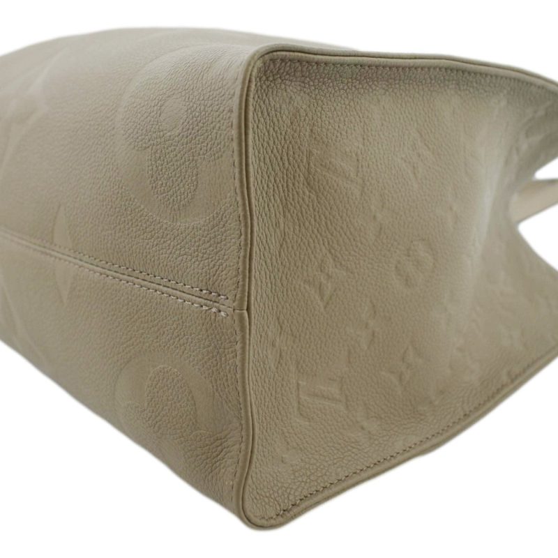 LOUIS VUITTON Onthego MM Giant Monogram Empreinte Leather Tote Shoulder Bag Tourterelle Beige - Image 7