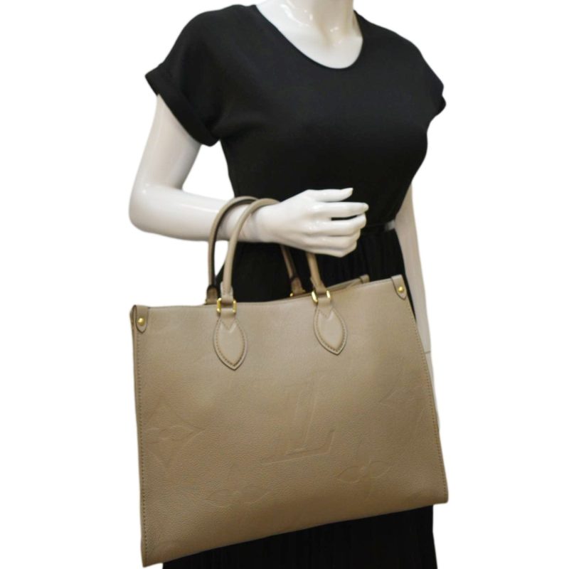LOUIS VUITTON Onthego MM Giant Monogram Empreinte Leather Tote Shoulder Bag Tourterelle Beige